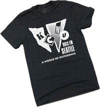 A black t-shirt with a vintage KCMU logo that looks very "eighties."